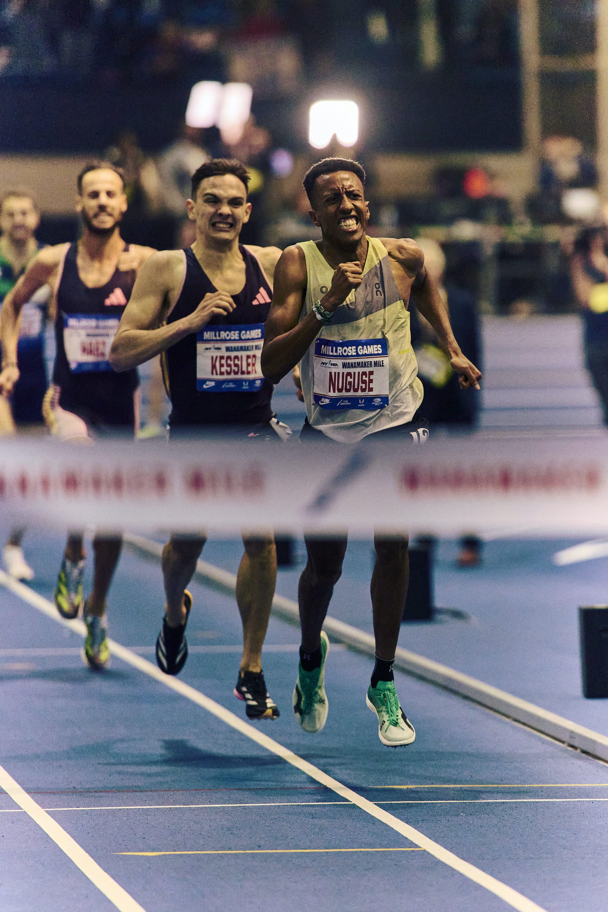 07 Jared Nuguse leading Hobbs Kessler to finish line Wanamaker Mile