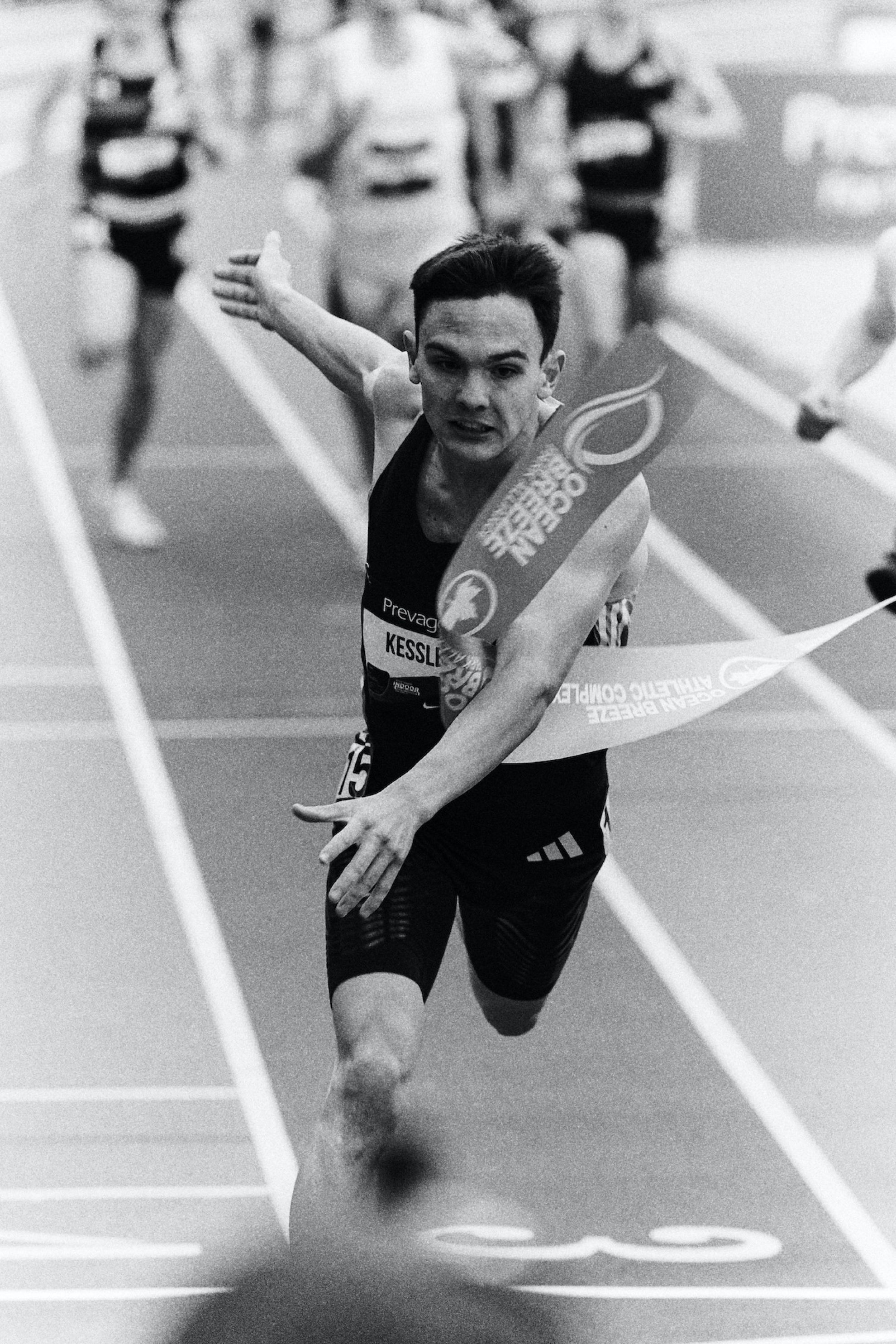 40 Hobbs Kessler b&w finish line tape 2024-JKH-USATFIndoors-Feb 22 2025-0263