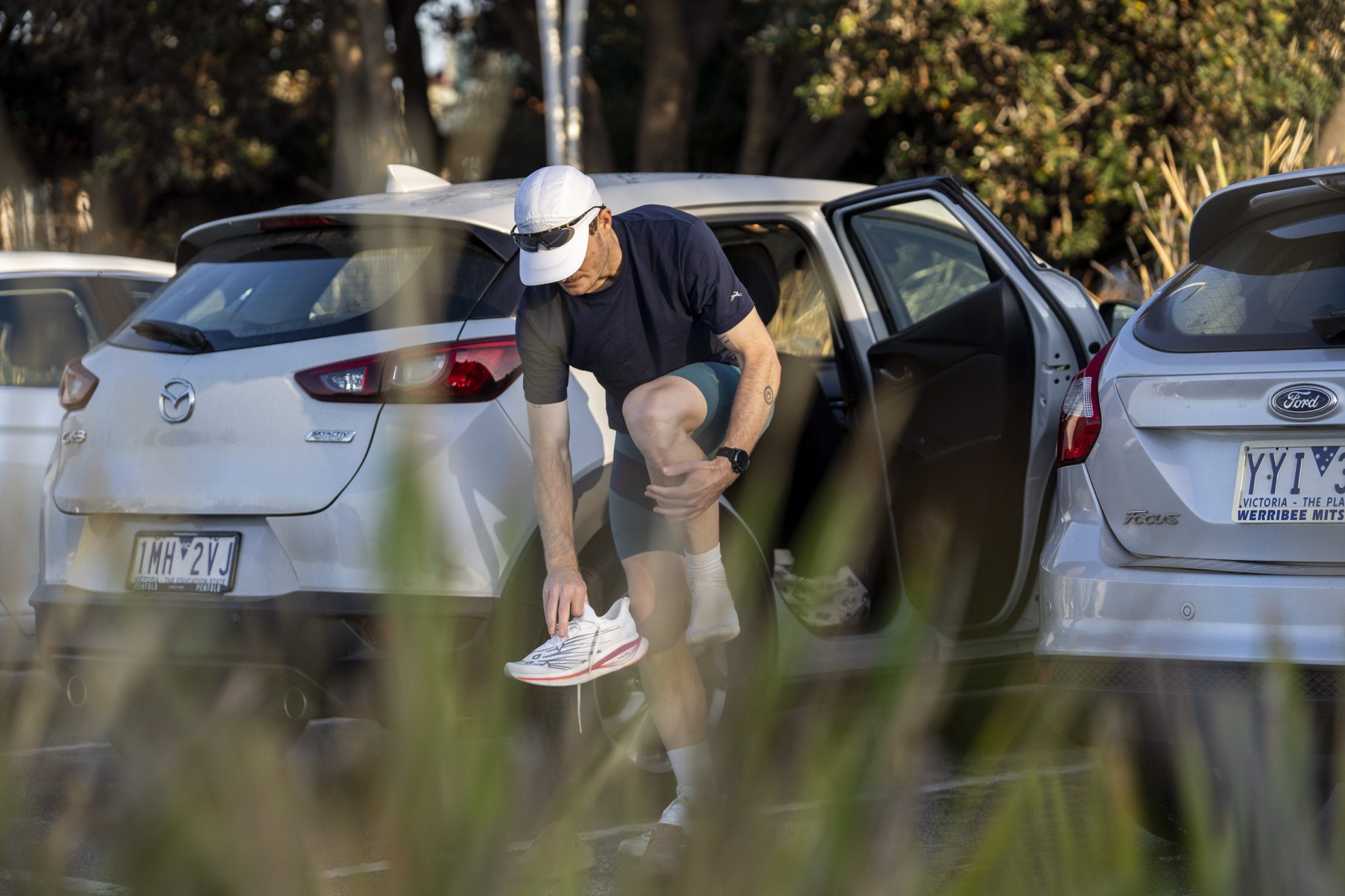 Pat with cars
