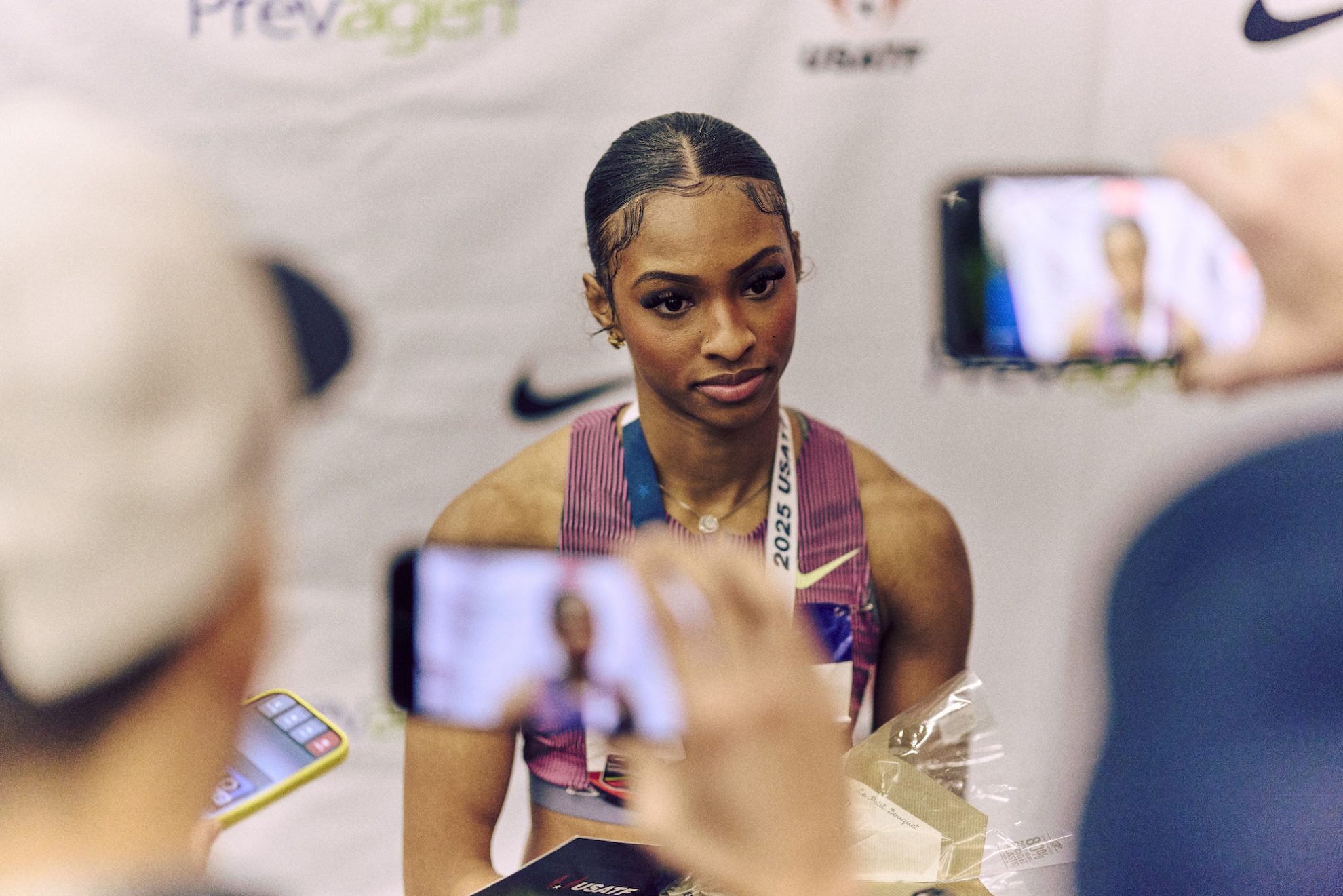 44.5 Masai Russell with media iPhones 2024-JKH-USATFIndoors-Feb 22 2025-0286