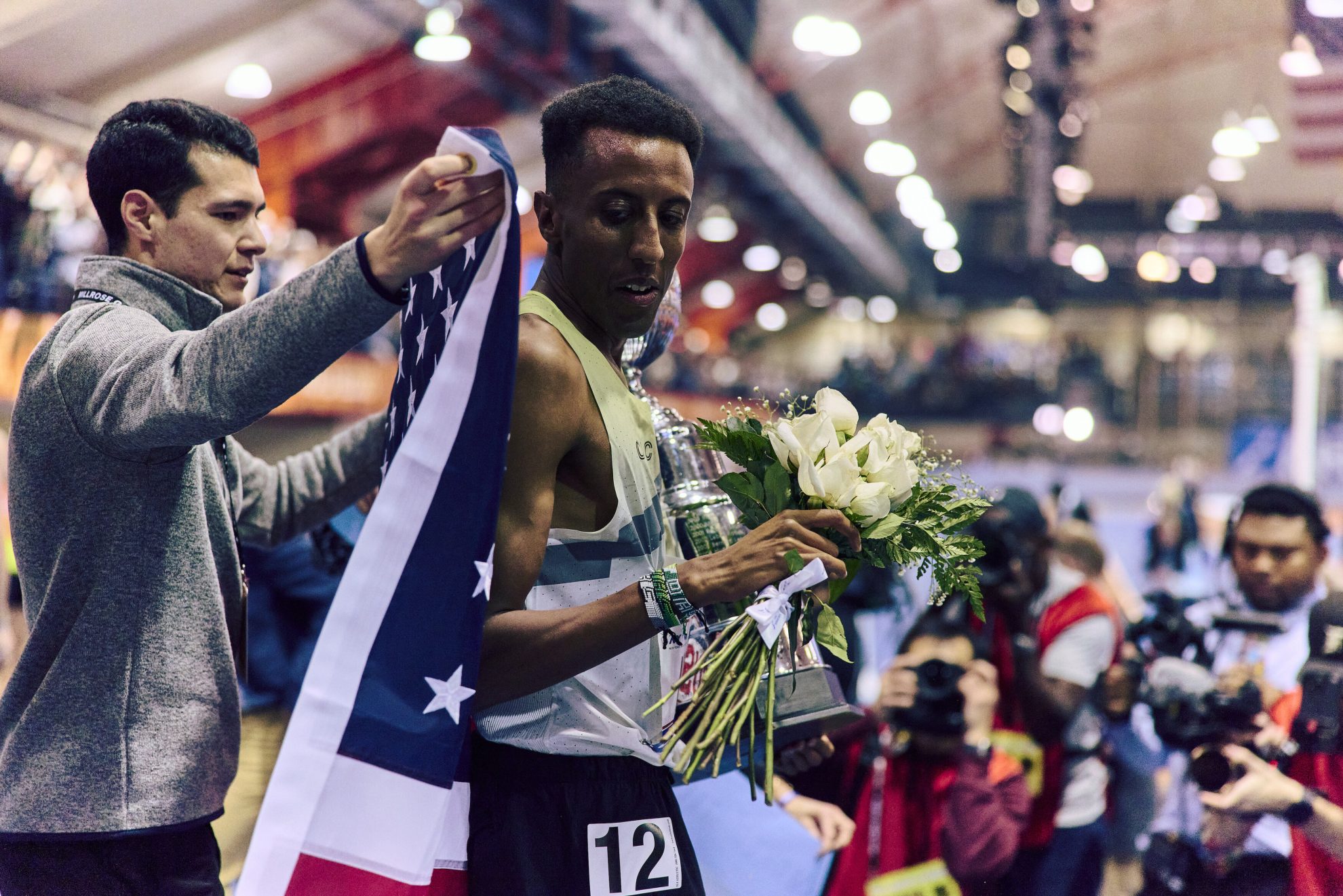 11 M Wanamaker Mile Jared Nuguse being draped in US flag