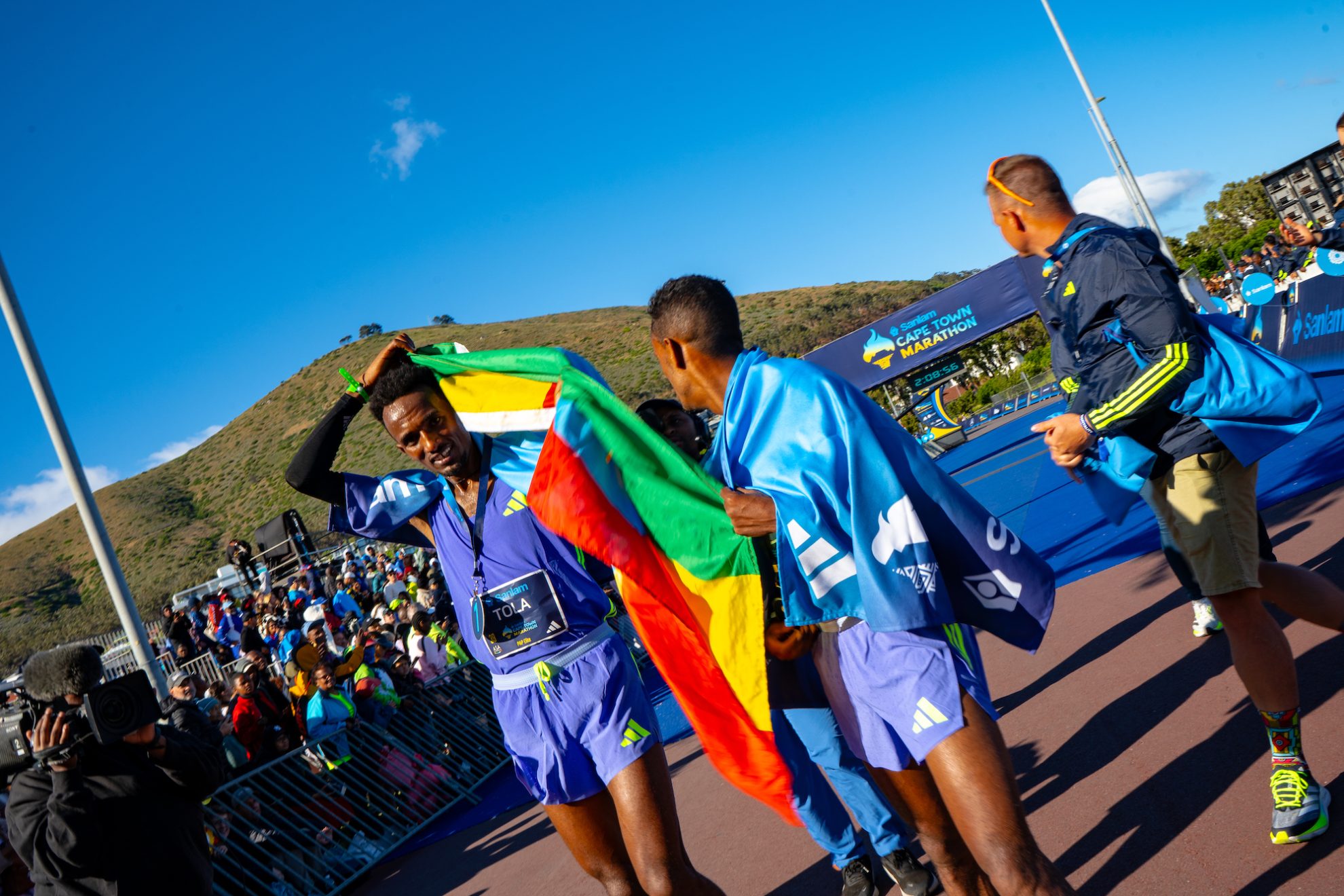 05 Abdisa Tola with flag post race